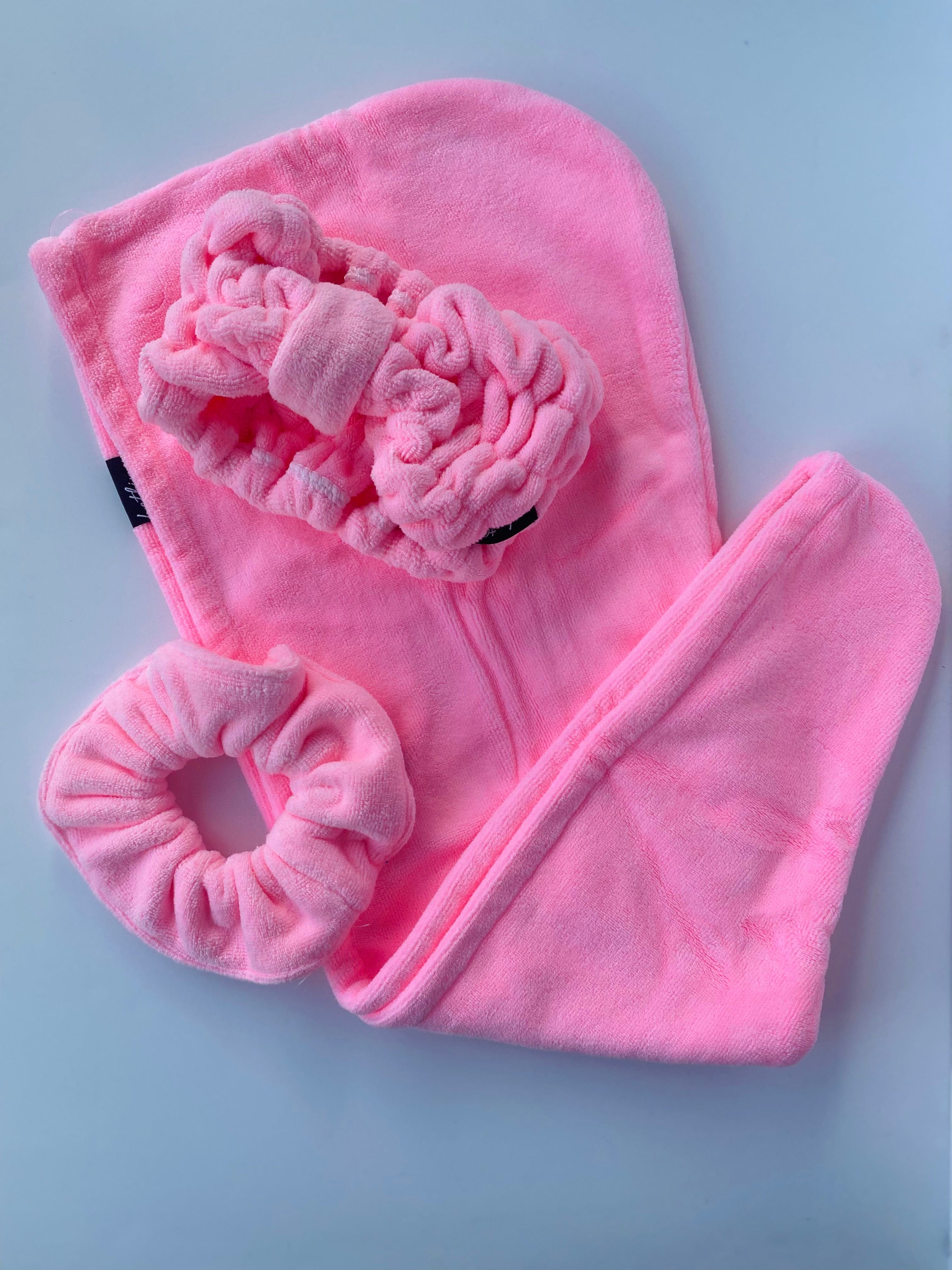 Wrap your hair in style with the Hot Pink Trina Towel Twist, perfect for reducing frizz and cutting down drying time