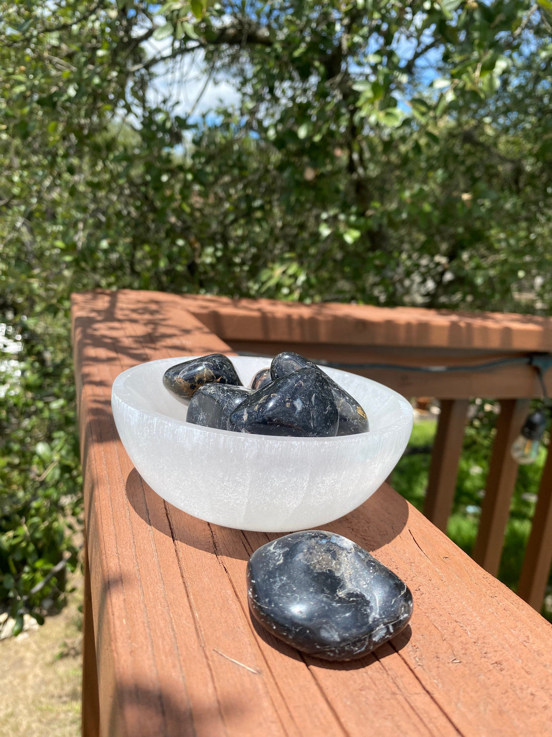 Protective Black Tourmaline tumbles, repelling negativity and transforming dense energy into a lighter vibration