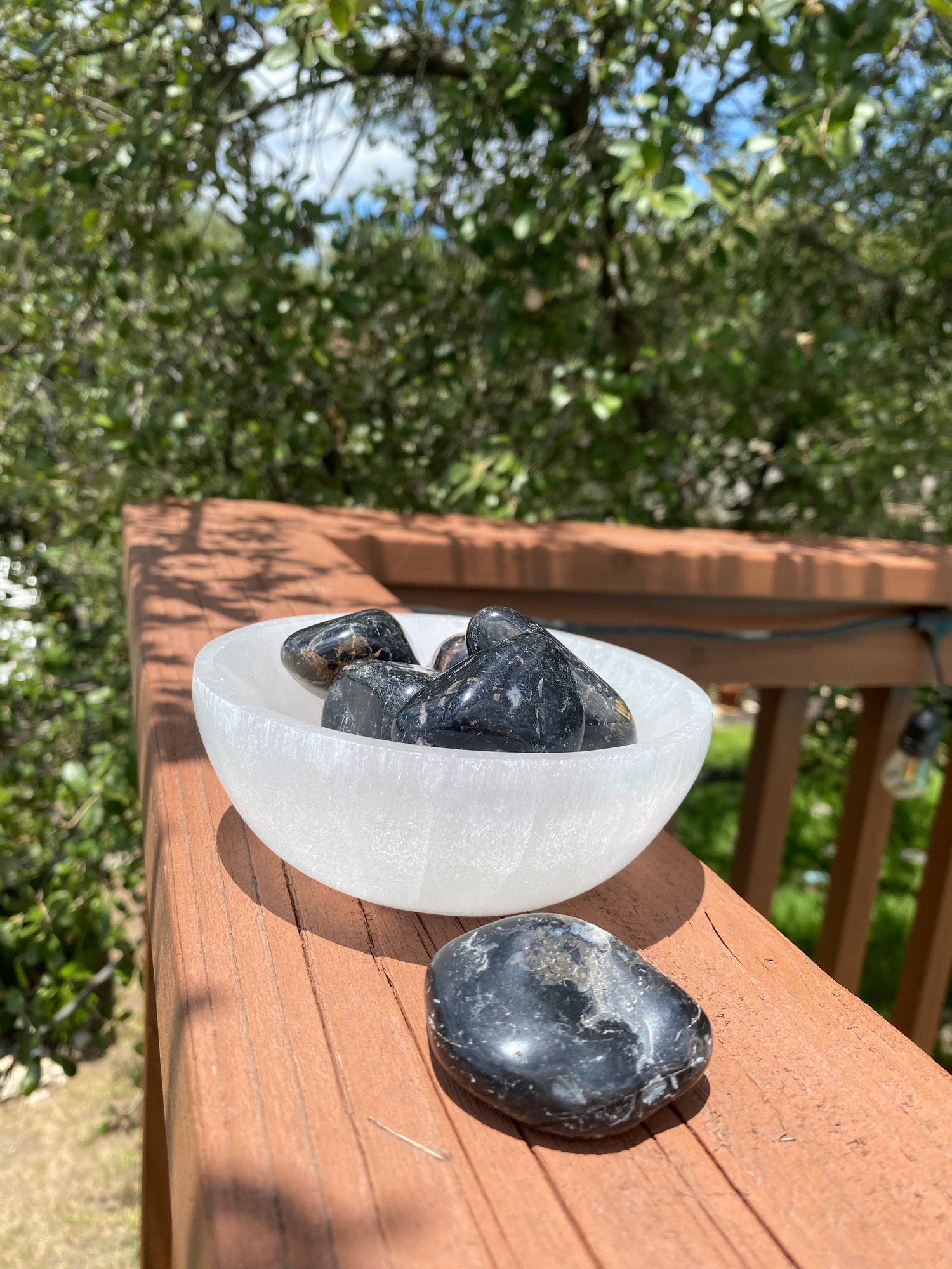 Protective Black Tourmaline tumbles, repelling negativity and transforming dense energy into a lighter vibration