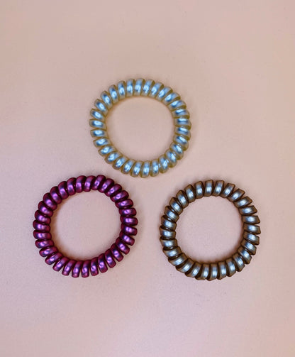 Rosé Coil Hair Ties, crease-less and ouch-less, perfect for all-day wear, comes in a set of 3 stunning colors for any hairstyle