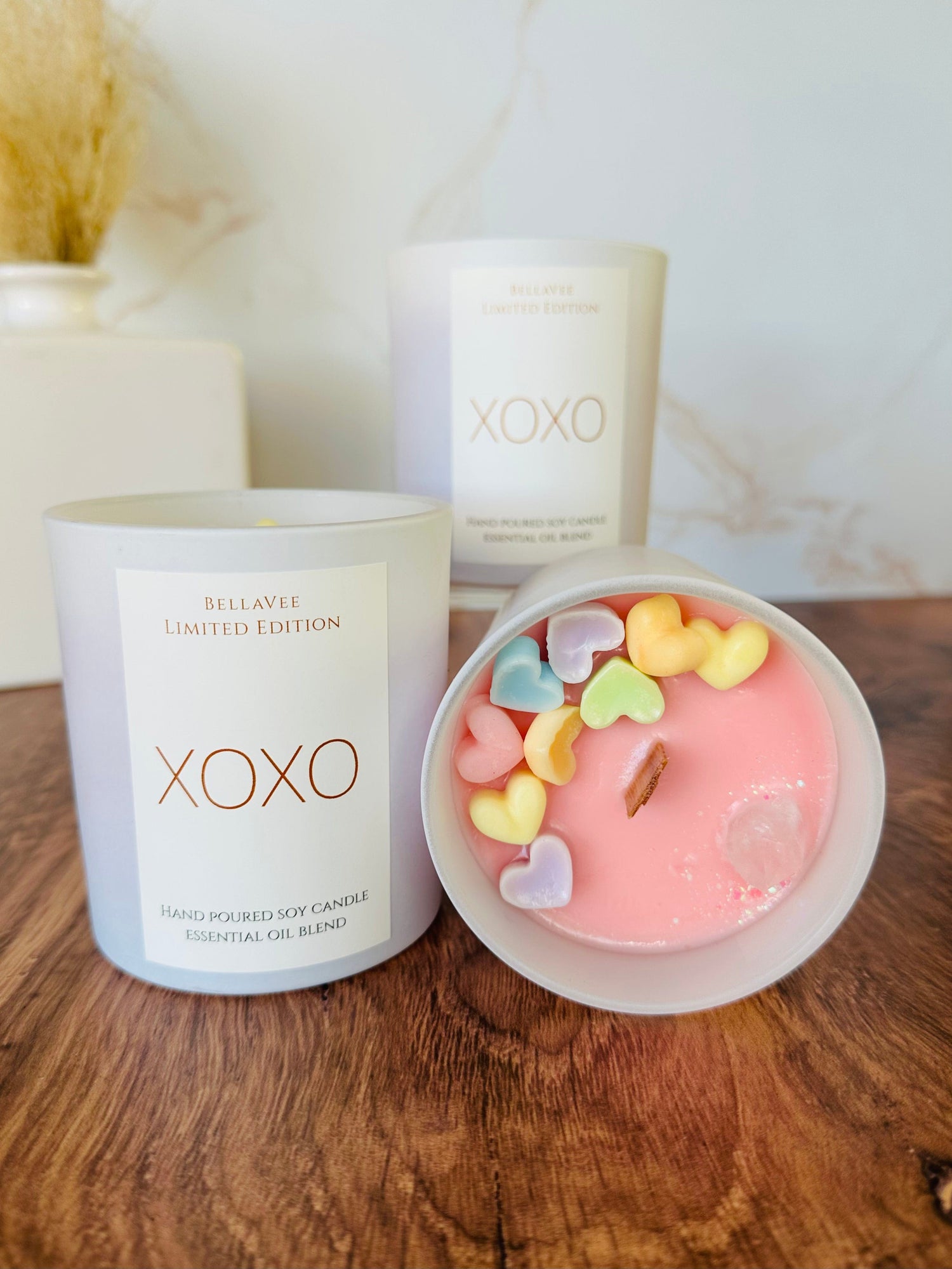 Adorned with vibrant, colorful hearts, the XOXO Crystal Candle makes a perfect gift, radiating love and positive energy