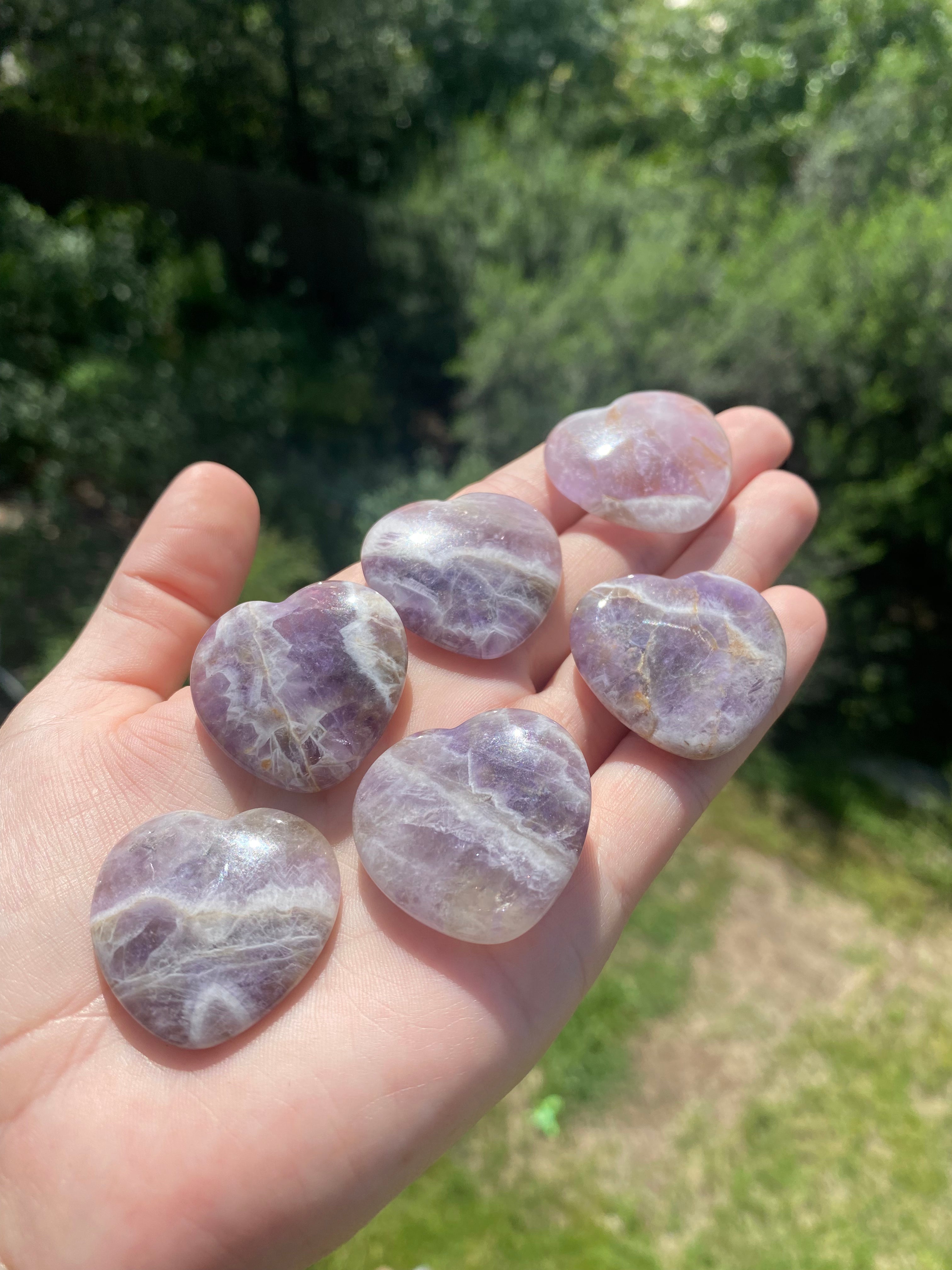 Amethyst heart stone, relieves stress, strain, and anxiety, enhances psychic abilities and spiritual awareness, promoting calm