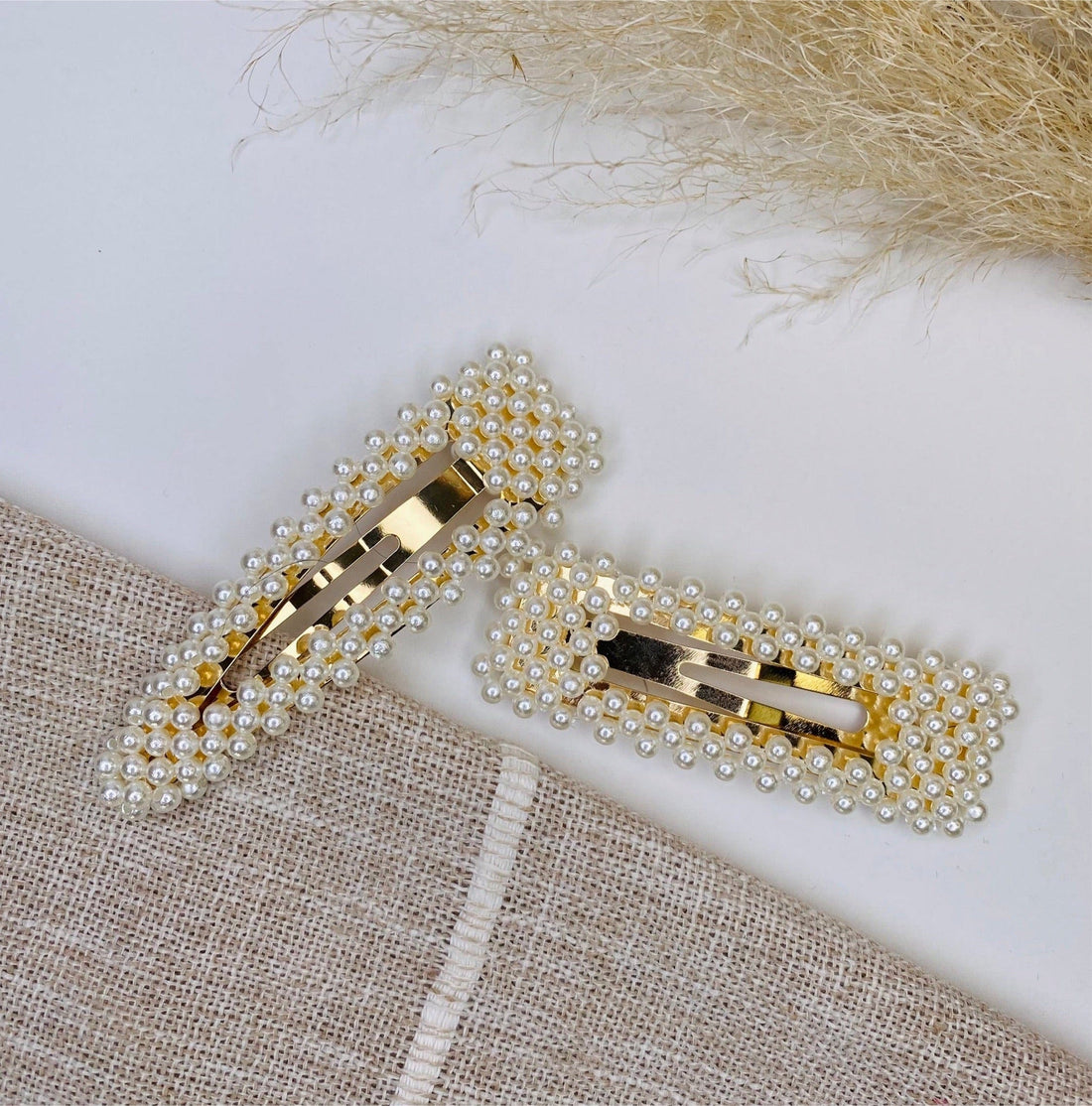Chloe Pearl Clip, a stylish accessory to complete any look, available in rectangle and pointed styles