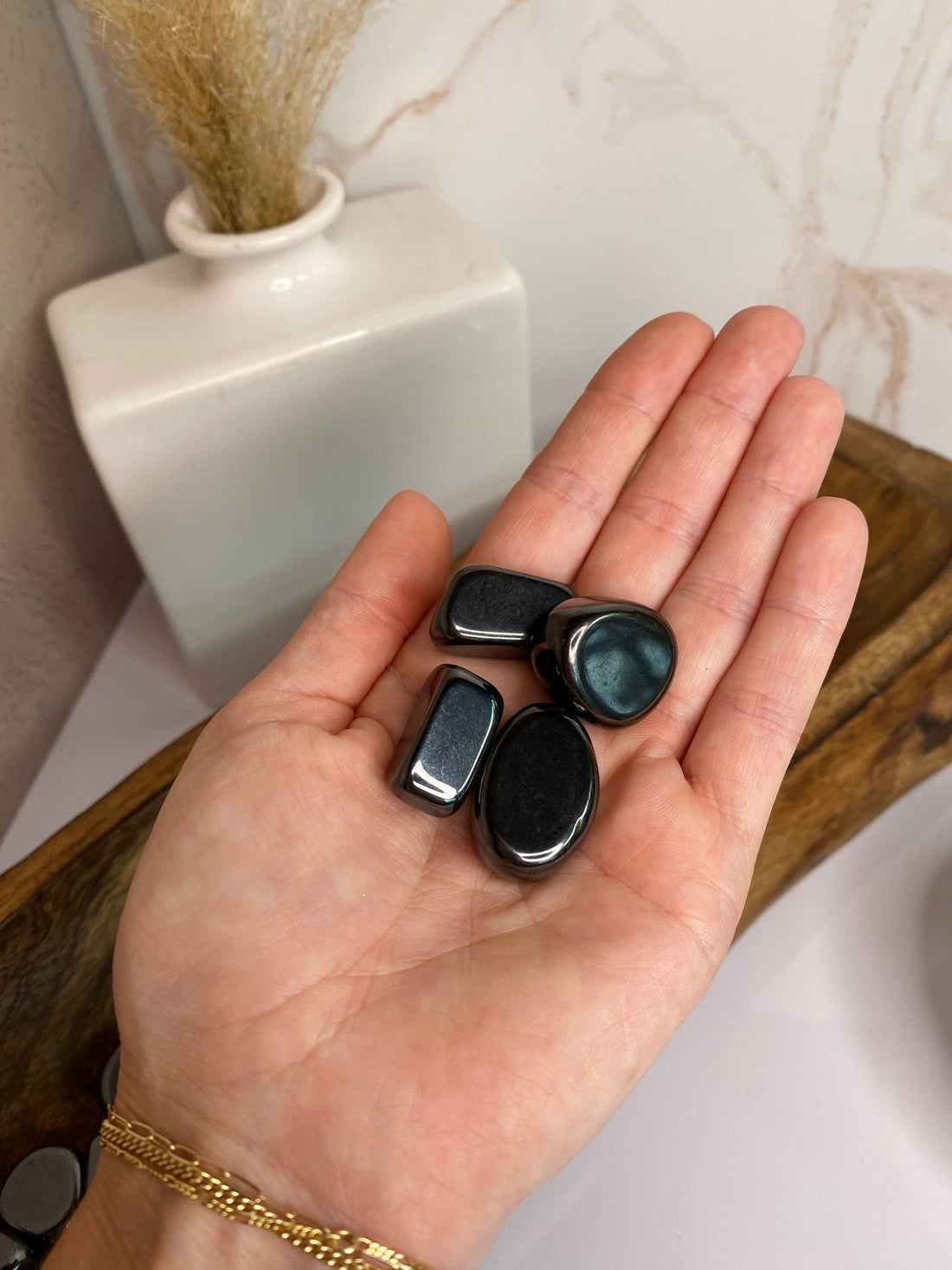 Hematite tumble, known for its grounding properties, helps balance energy and neutralize negativity, ideal for root chakra alignment
