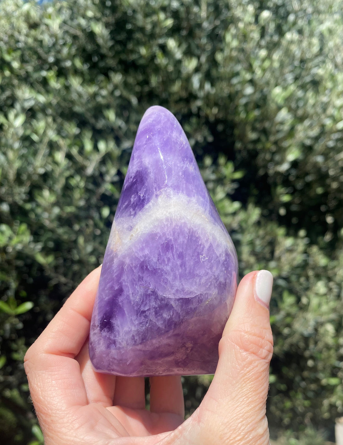Polished Chevron Amethyst freeform with white Quartz banding, promoting stress relief and self-discovery