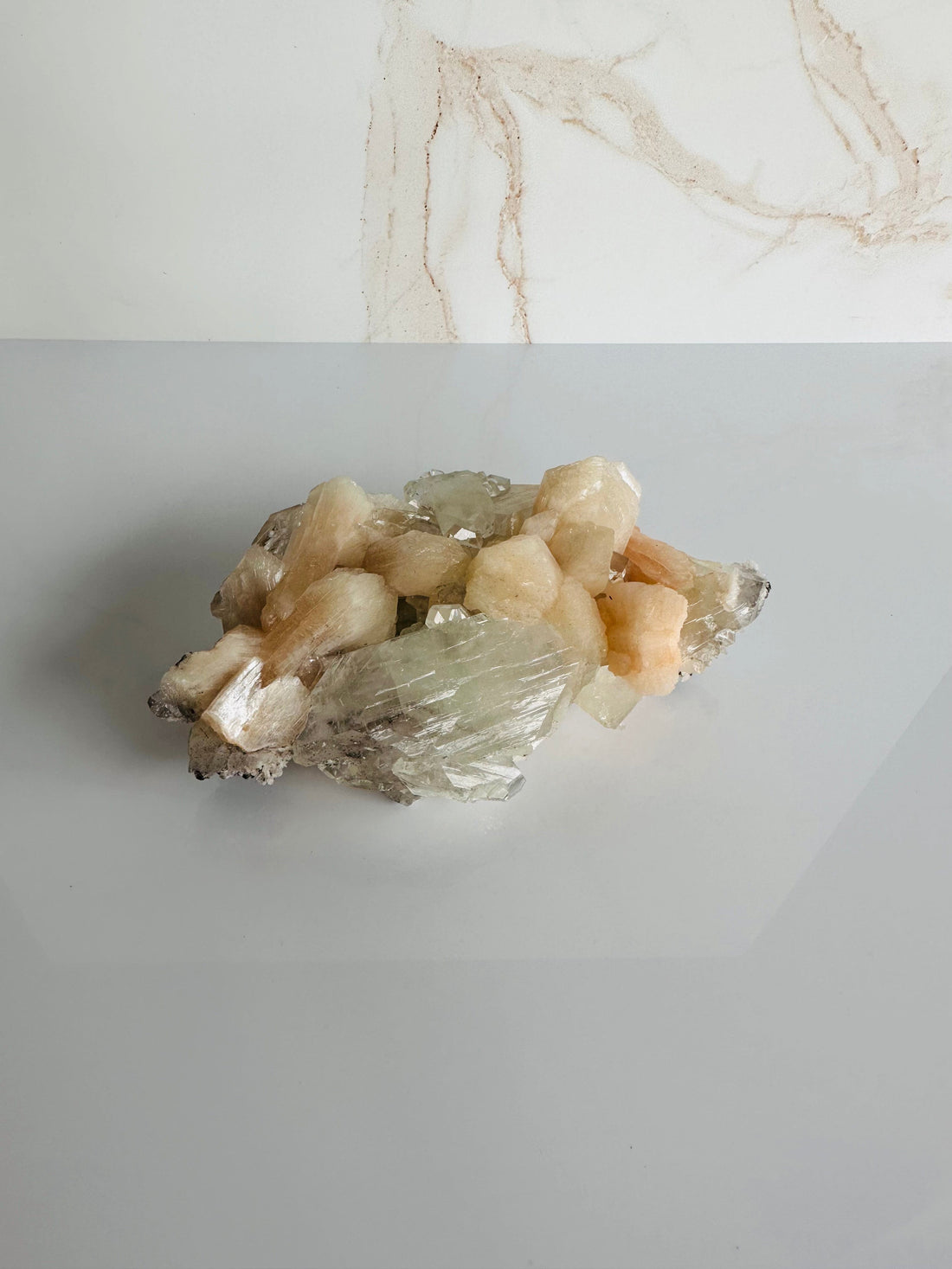 Pink Stilbite with Clear Quartz, a heart chakra stone, promotes love, joy, and healing energy, perfect for instilling peace and hope